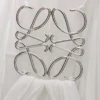 Abito drappeggiato in seta bianco Abito drappeggiato in seta bianco