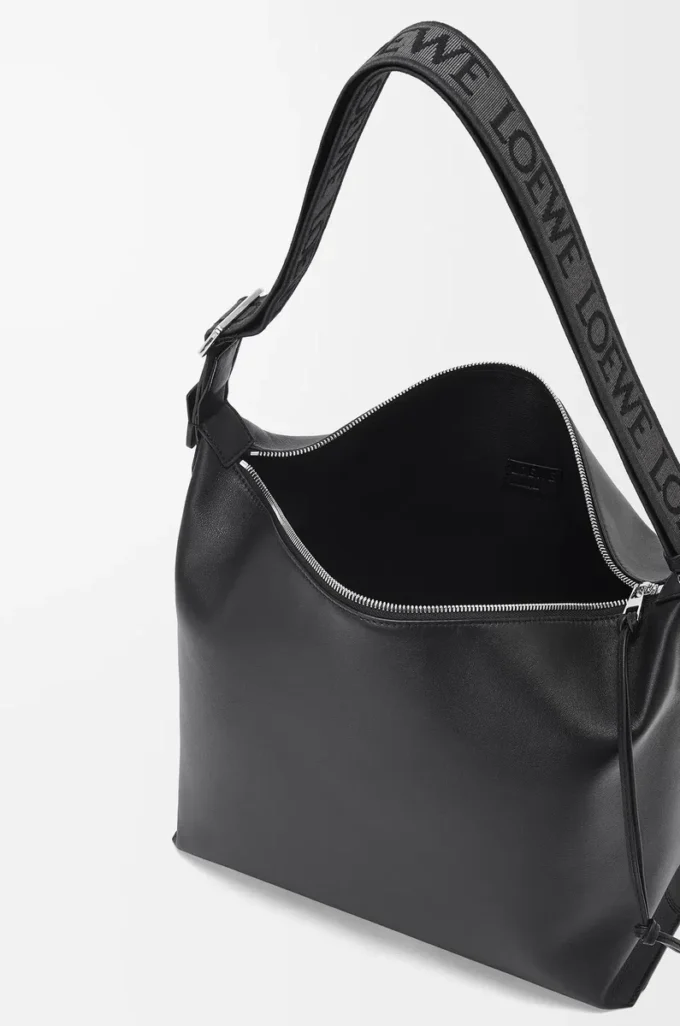 Borsa a tracolla Cubi in morbida pelle di vitello liscia e jacquard nero