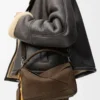 Borsa Featherlight Puzzle piccola in nubuck granulato Tundra