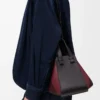 Borsa Hammock compatta in pelle di vitello nappa nero/bordeaux