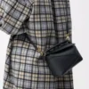 Borsa Mini Puzzle Edge in morbida pelle di vitello martellata Black