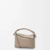 Borsa Mini Puzzle Edge in morbida pelle di vitello martellata Clay