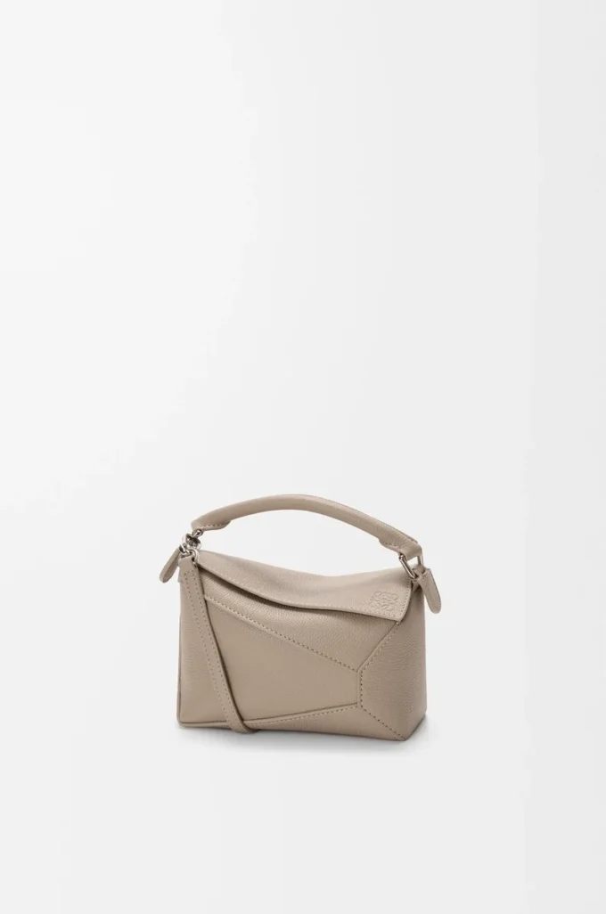 Borsa Mini Puzzle Edge in morbida pelle di vitello martellata Clay