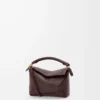 Borsa Mini Puzzle Edge in morbida pelle di vitello martellata Dark Chestnut