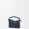 Borsa Mini Puzzle Edge in morbida pelle di vitello martellata Deep Navy
