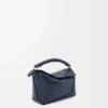 Borsa Mini Puzzle Edge in morbida pelle di vitello martellata Deep Navy