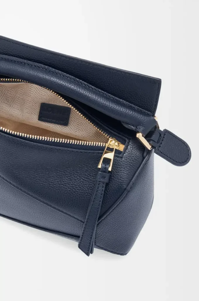 Borsa Mini Puzzle Edge in morbida pelle di vitello martellata Deep Navy