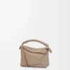 Borsa Mini Puzzle Edge in morbida pelle di vitello martellata Sand
