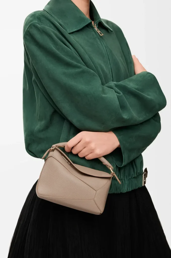 Borsa Mini Puzzle Edge in morbida pelle di vitello martellata Sand