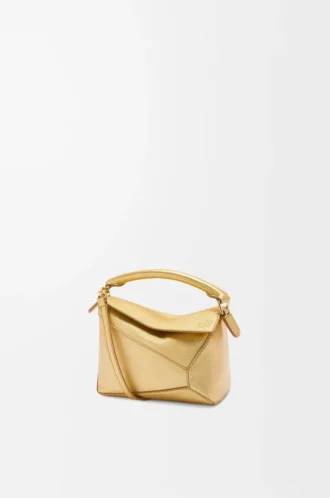 Borsa Mini Puzzle Edge in pelle di agnello laminata Gold