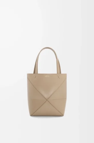 Borsa Mini Puzzle Fold in pelle di vitello lucida color sabbia