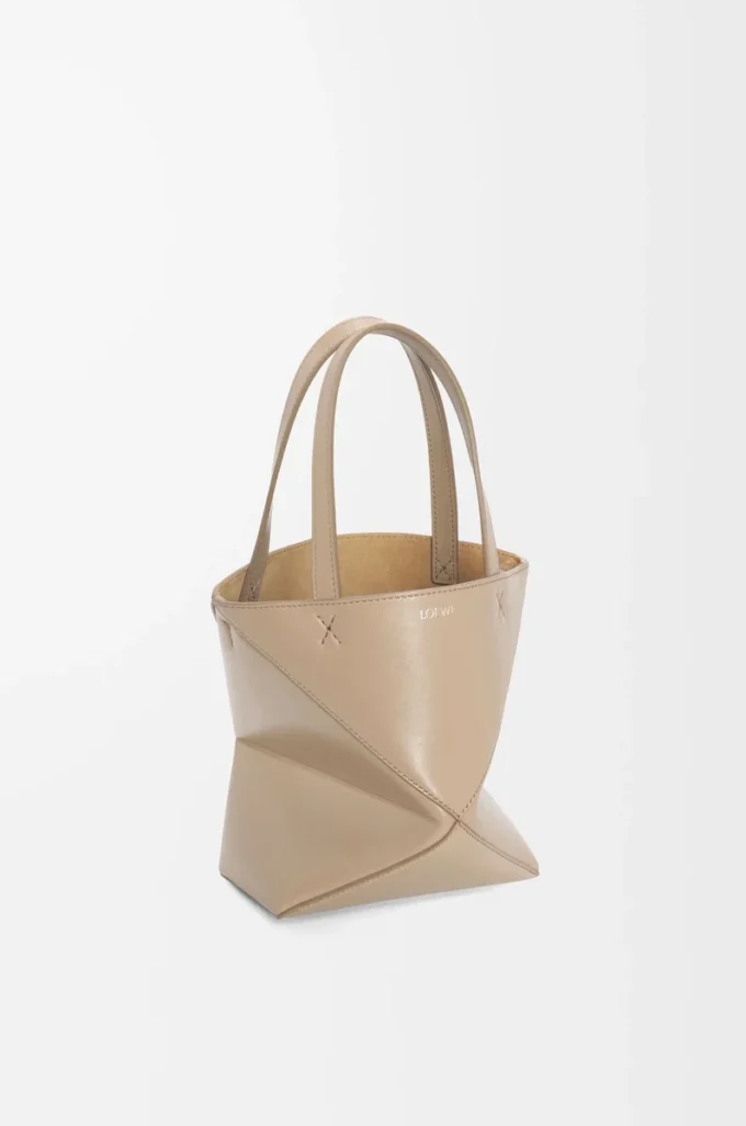 Borsa Mini Puzzle Fold in pelle di vitello lucida color sabbia Borsa Mini Puzzle Fold in pelle di vitello lucida color sabbia