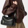 Borsa Puzzle Biker piccola in pelle di vitello lucida nera Borsa Puzzle Biker piccola in pelle di vitello lucida nera
