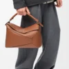 Borsa Puzzle Edge grande in pelle di vitello classica Tan
