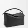 Borsa Puzzle Edge grande in pelle di vitello martellata nera Borsa Puzzle Edge grande in pelle di vitello martellata nera