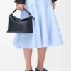 Borsa Puzzle Edge piccola in morbida pelle di vitello martellata Deep Navy Borsa Puzzle Edge piccola in morbida pelle di vitello martellata Deep Navy