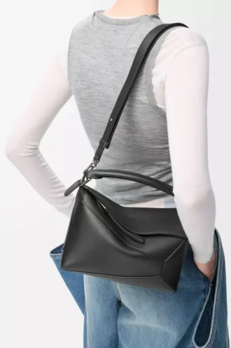Borsa Small Puzzle Edge in pelle di vitello classica nera