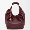 Borsa Squeeze media in morbida pelle di agnello nappa Dark Burgundy Borsa Squeeze media in morbida pelle di agnello nappa Dark Burgundy
