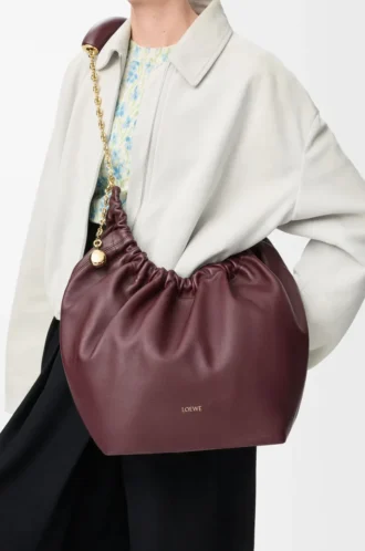Borsa Squeeze media in morbida pelle di agnello nappa Dark Burgundy