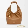 Borsa Squeeze media in morbida pelle di agnello nappa Oak