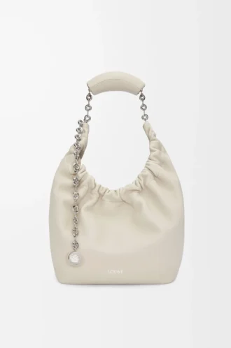 Borsa Squeeze piccola in morbida pelle di agnello nappa color sale marino