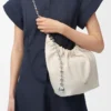 Borsa Squeeze piccola in morbida pelle di agnello nappa color sale marino