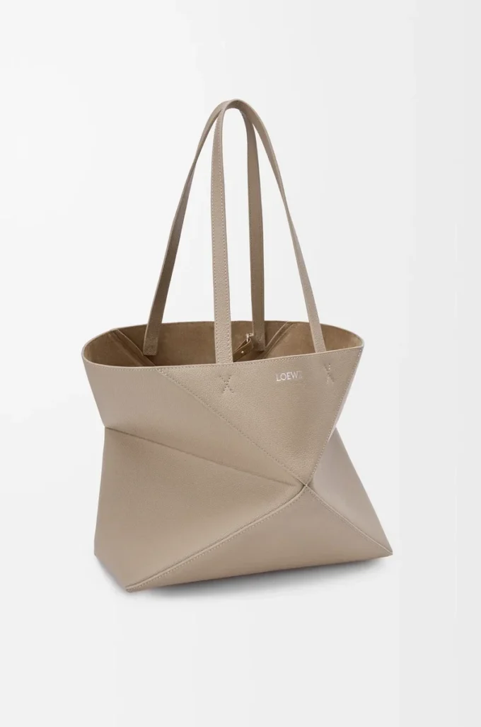 Borsa tote Puzzle Fold orizzontale media in morbida pelle di vitello martellata Clay Borsa tote Puzzle Fold orizzontale media in morbida pelle di vitello martellata Clay