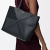Borsa tote Puzzle Fold orizzontale media in morbida pelle di vitello martellata Nero Borsa tote Puzzle Fold orizzontale media in morbida pelle di vitello martellata Nero