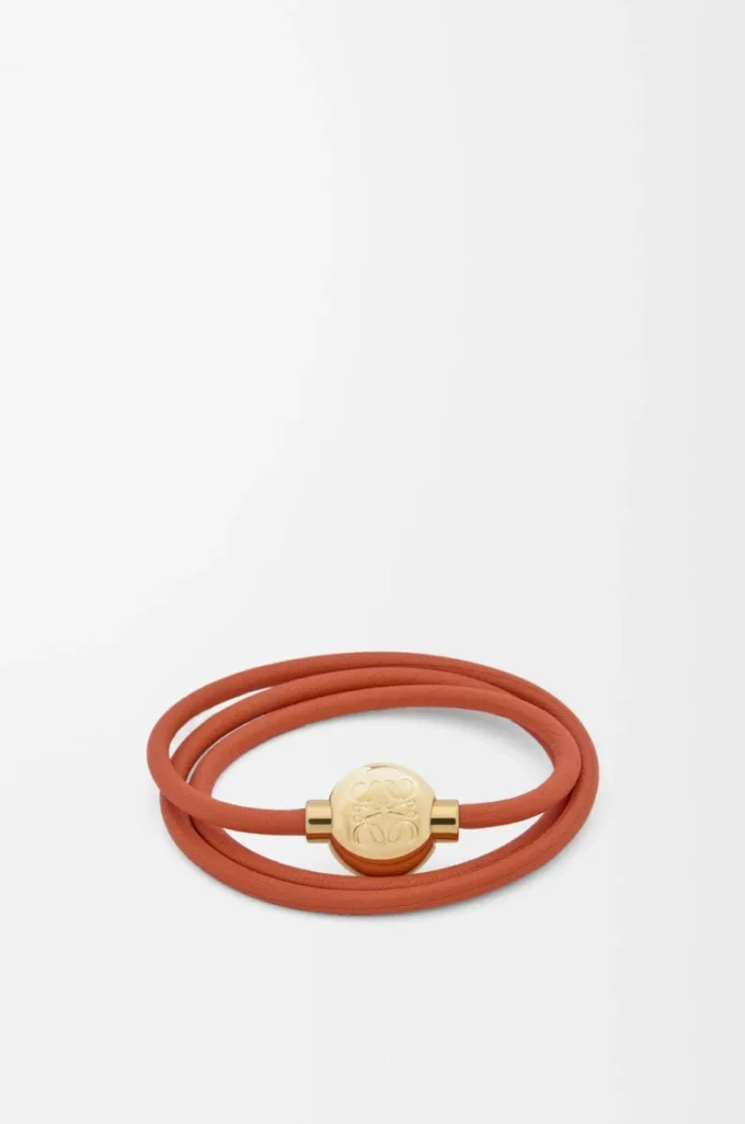 Bracciale Pebble in pelle di vitello arancione/oro