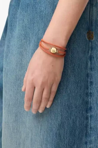 Bracciale Pebble in pelle di vitello arancione/oro