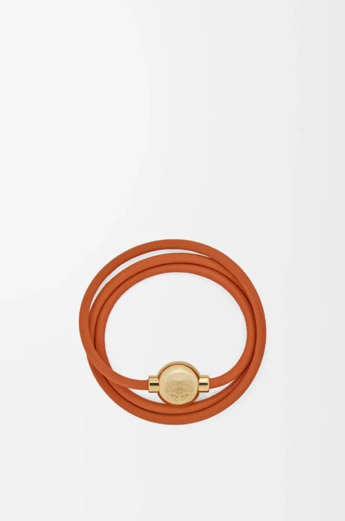 Bracciale Pebble in pelle di vitello arancione/oro