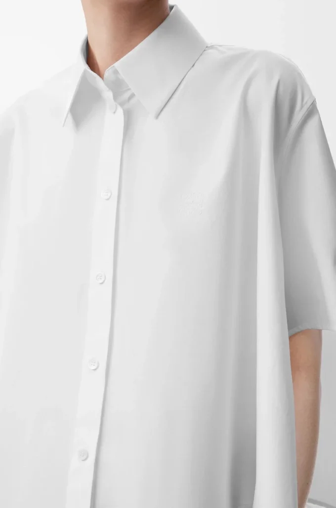 Camicia trapezio a maniche corte in cotone bianco Camicia trapezio a maniche corte in cotone bianco