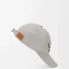 Cappellino con patch L in cotone grigio guscio Cappellino con patch L in cotone grigio guscio