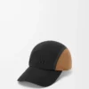 Cappellino da campeggio in tela e pelle scamosciata nero/oro scuro Cappellino da campeggio in tela e pelle scamosciata nero/oro scuro