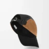 Cappellino da campeggio in tela e pelle scamosciata nero/oro scuro Cappellino da campeggio in tela e pelle scamosciata nero/oro scuro