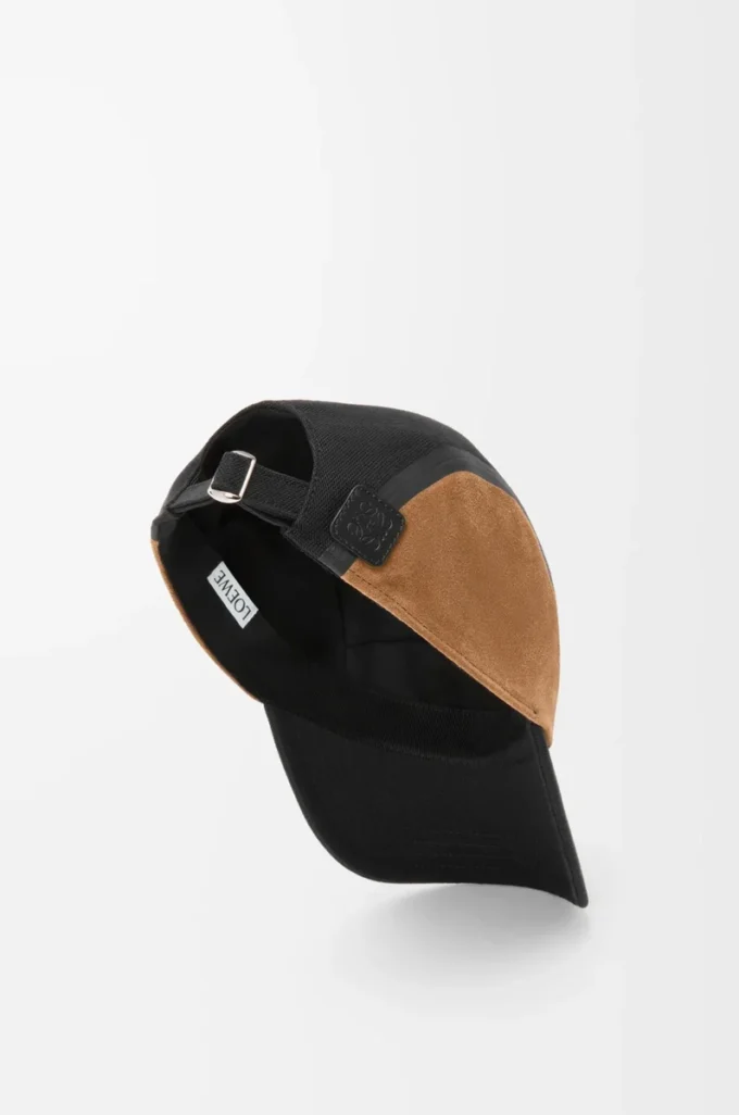 Cappellino da campeggio in tela e pelle scamosciata nero/oro scuro Cappellino da campeggio in tela e pelle scamosciata nero/oro scuro