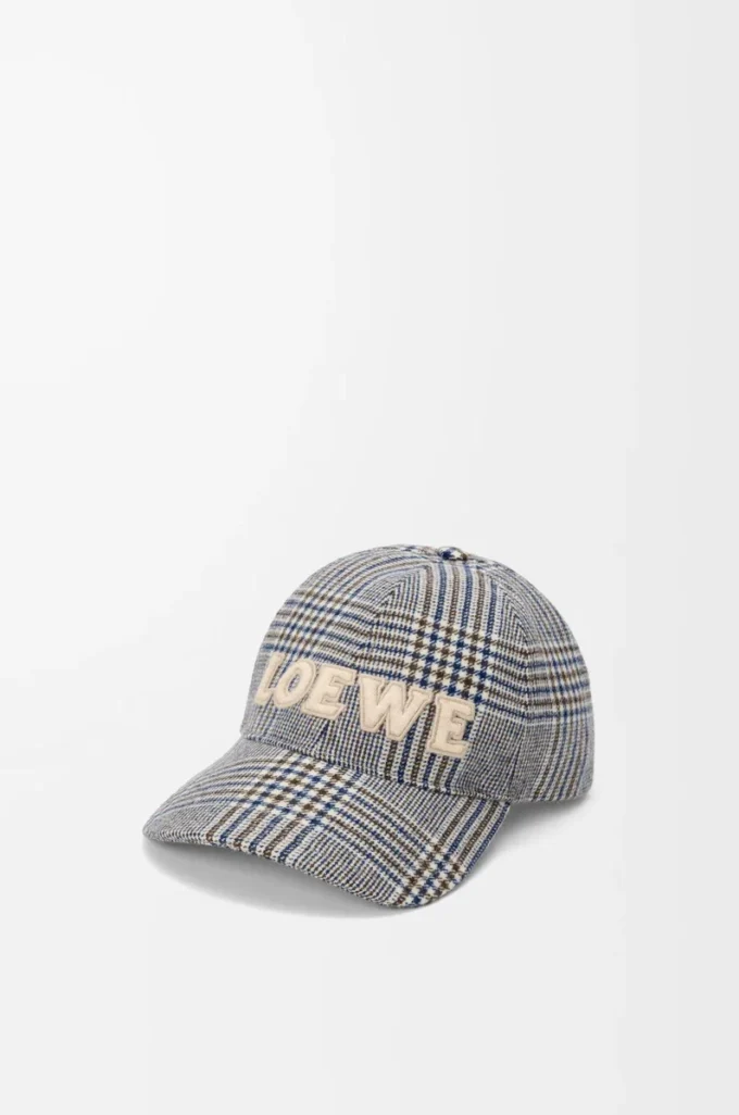 Cappellino in lana blu/bianco Cappellino in lana blu/bianco