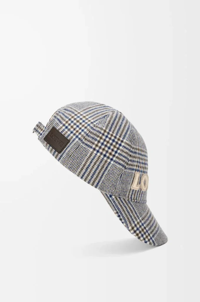Cappellino in lana blu/bianco Cappellino in lana blu/bianco