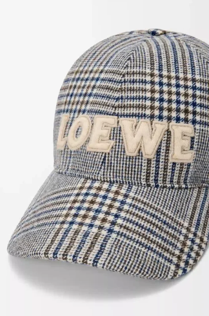 Cappellino in lana blu/bianco Cappellino in lana blu/bianco