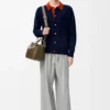 Cardigan polo in lana blu navy/arancione Cardigan polo in lana blu navy/arancione