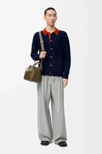 Cardigan polo in lana blu navy/arancione