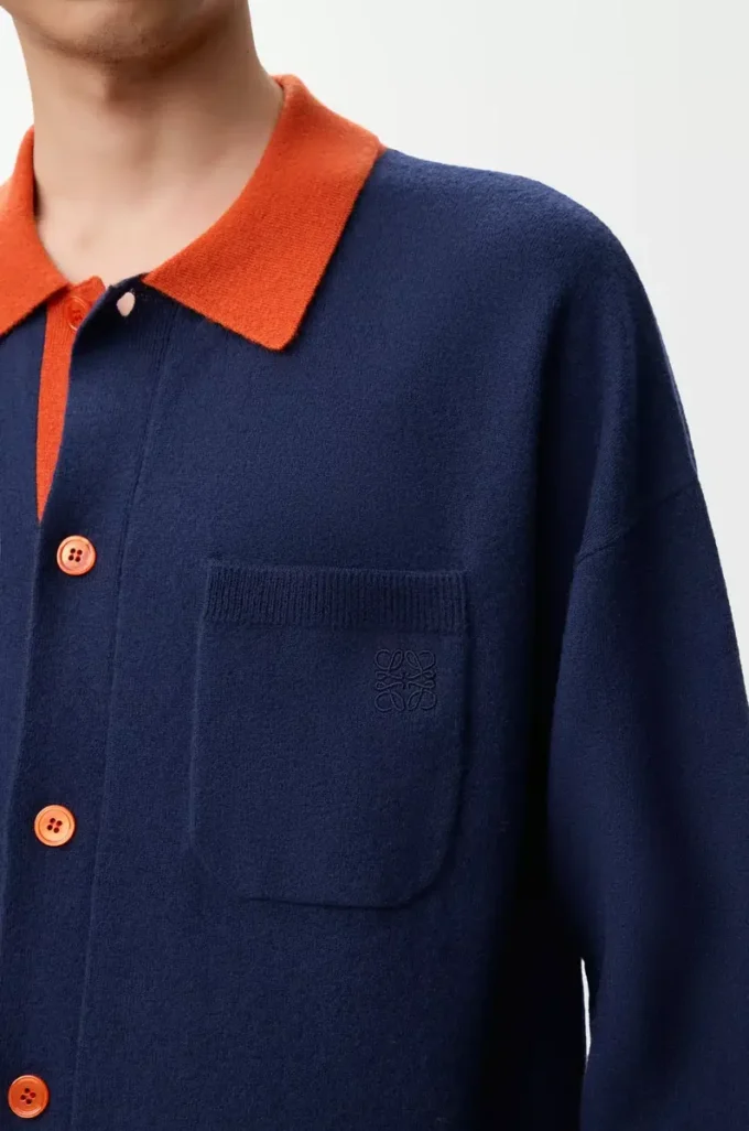 Cardigan polo in lana blu navy/arancione Cardigan polo in lana blu navy/arancione