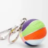 Ciondolo a forma di pallone da basket in pelle di vitello e metallo Multicolore Ciondolo a forma di pallone da basket in pelle di vitello e metallo Multicolore