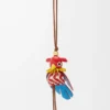 Ciondolo Parrot Puzz Marrone chiaro/Rosso