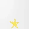 Dadi a forma di stella marina in pelle di vitello giallo/marrone chiaro Dadi a forma di stella marina in pelle di vitello giallo/marrone chiaro