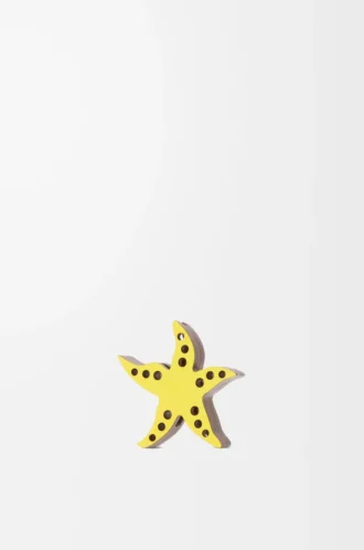 Dadi a forma di stella marina in pelle di vitello giallo/marrone chiaro