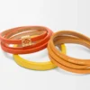 Doppio bracciale intrecciato in pelle di vitello Arancione vivace/Giallo Doppio bracciale intrecciato in pelle di vitello Arancione vivace/Giallo