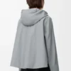 Giacca con cappuccio in cotone grigio chiaro Giacca con cappuccio in cotone grigio chiaro