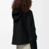 Giacca con cappuccio in shearling Nero Giacca con cappuccio in shearling Nero