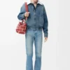 Giacca con zip in denim blu Giacca con zip in denim blu